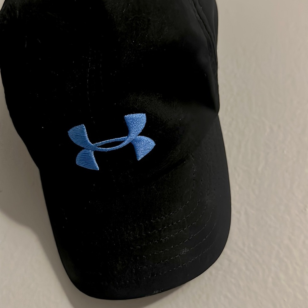 Black and blue under armor hat